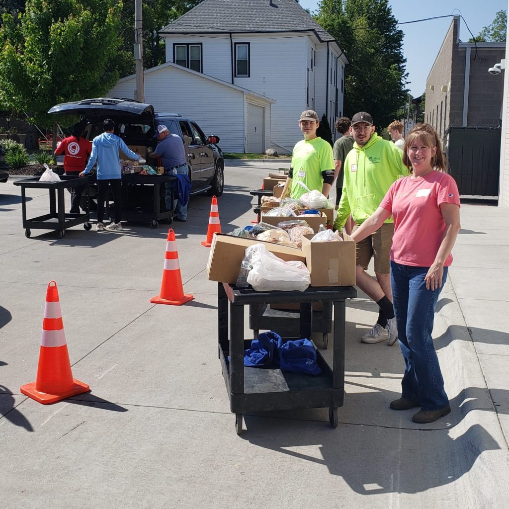 Carmel Conway (in red shirt), president of CNC, is a kind-hearted person who thinks about others.