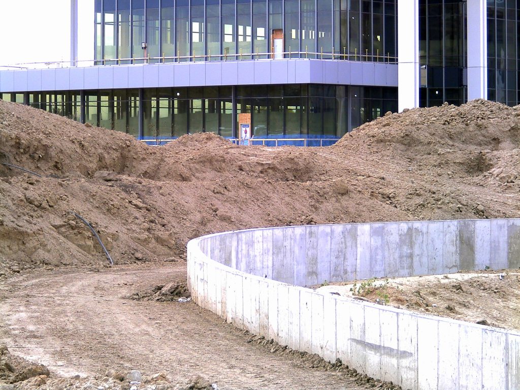 As-Built survey was needed here to build a metal top for a walled clean water containment structure.